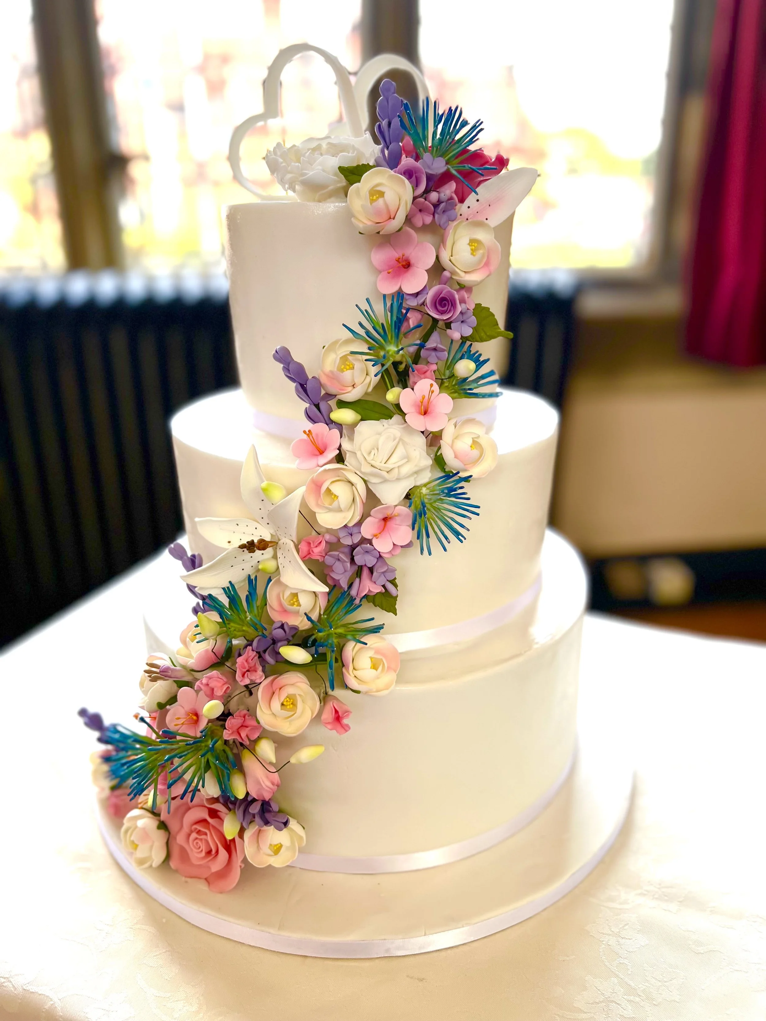 An elegant wedding cake setup with premium styling.