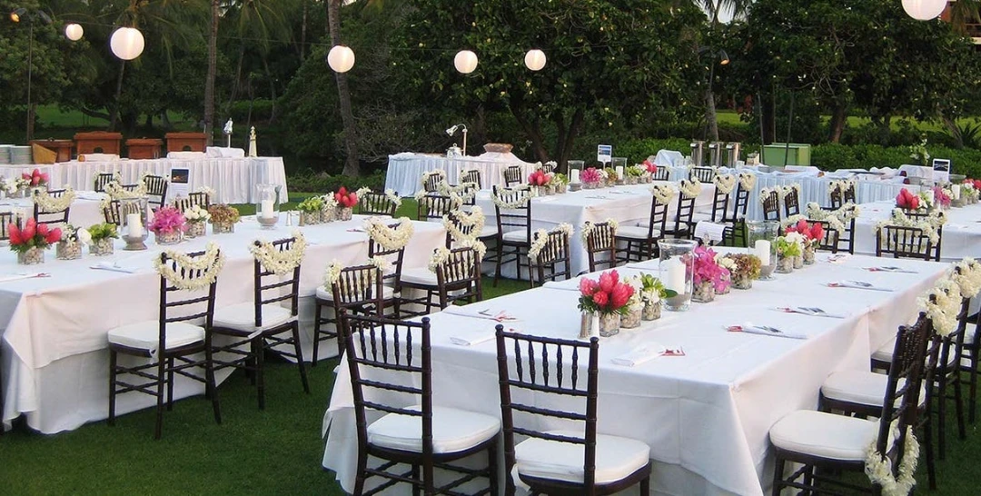 An outside catering arrangement with prepared dishes and hospitality presentation.